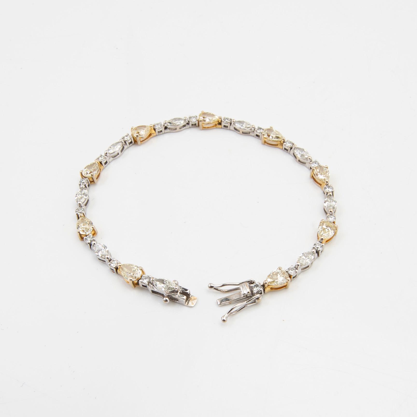 Armband, 18 k guld och vitguld med briljanter.