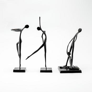 Three patinated bronze sculptures designed by Bodrul Khalique.