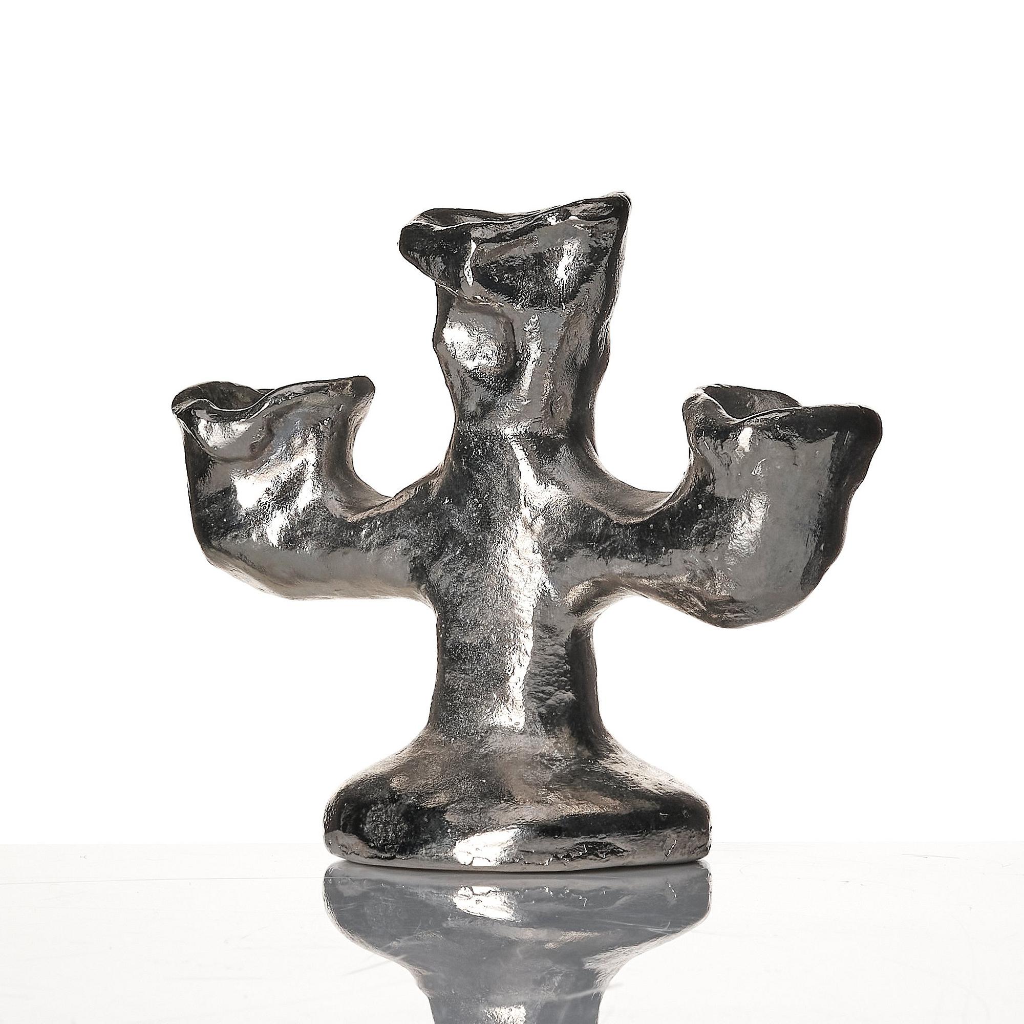 Dan Wolgers, "Källa (Trearmad ljusstake)".