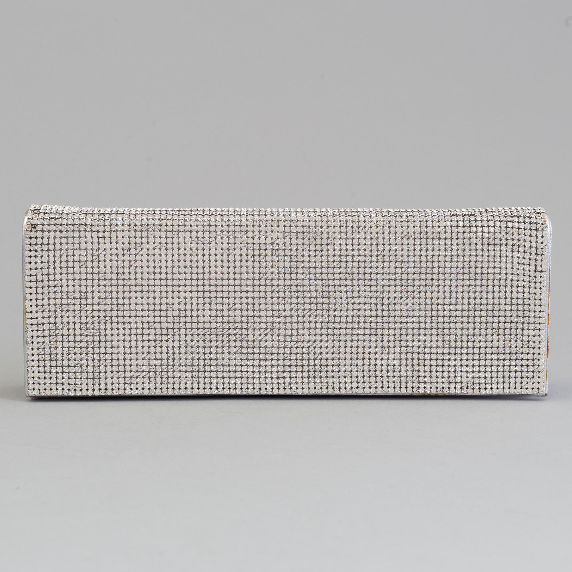 A silver- and glasstone clutch by Rene Caovilla.