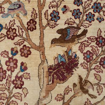 A RUG, a semi-antique Esfahan probably, figural, ca 214,5 x 137,5 cm.