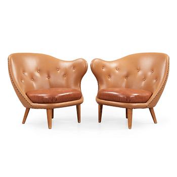 Arne Norell, A pair of Arne Norell 'Tummen/ The Thumb' easy chairs, Gösta Westerbergs Möbler, Stockholm 1950's.