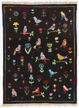 A hand-embroidered Kelim rug, 204 x 150 cm.