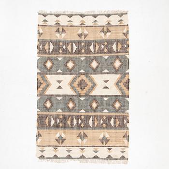 An Indian flat weave carpet,  approx. 287 x 174 cm.