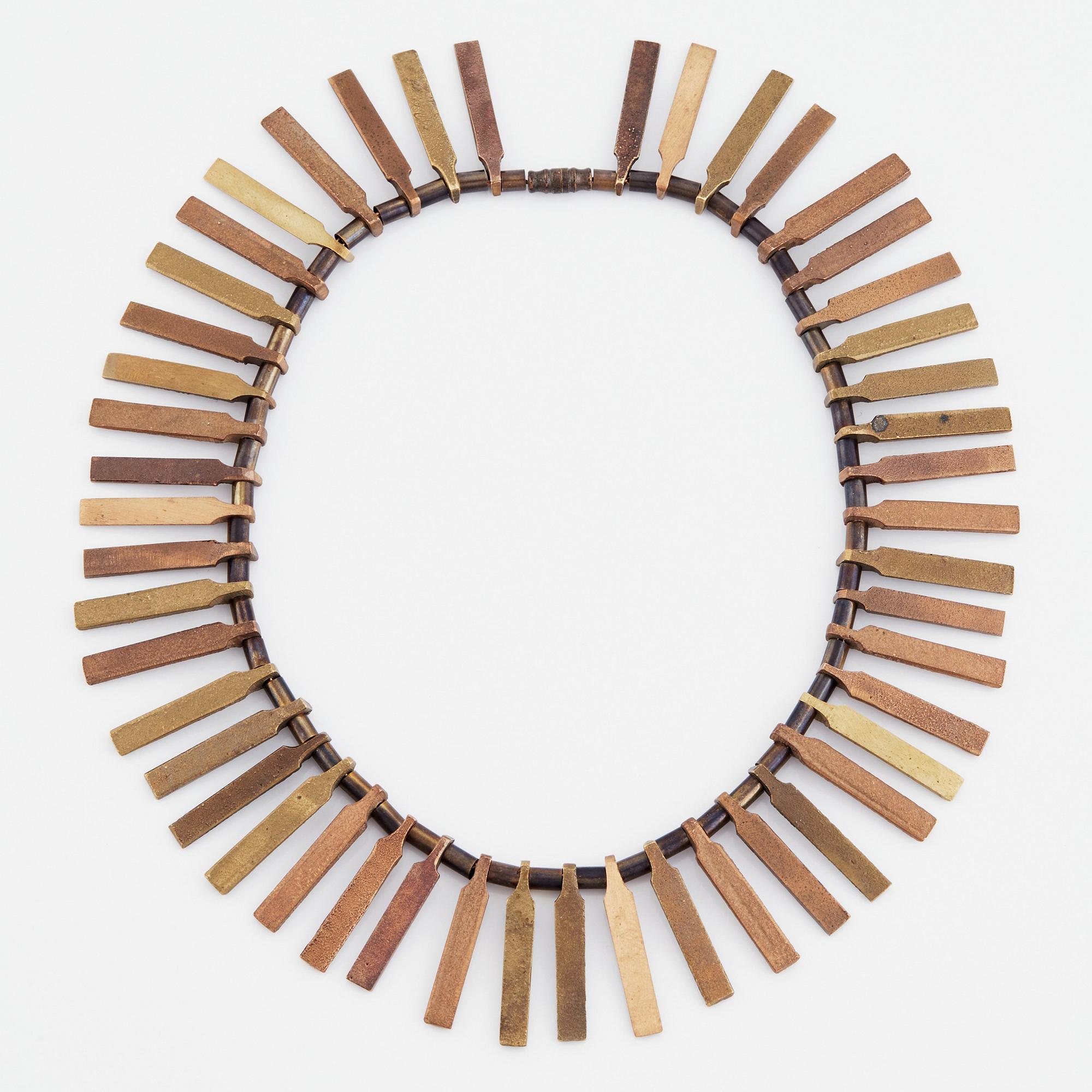 Inga-Britt "Ibe" Dahlquist, a bronze necklace "Nefertiti".