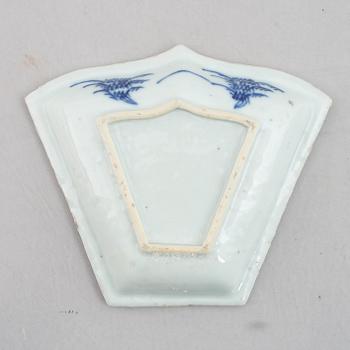A group of four blue and white dishes and a cabaret piece, Qing dynasty, 18th century.