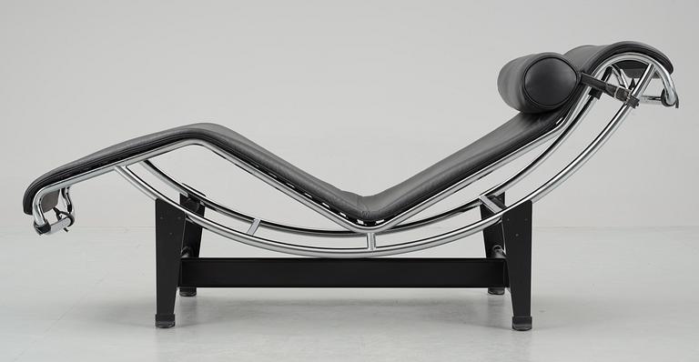 A Le Corbusier 'LC 4' black leather and chromed steel reclining chair, Cassina, Italy.