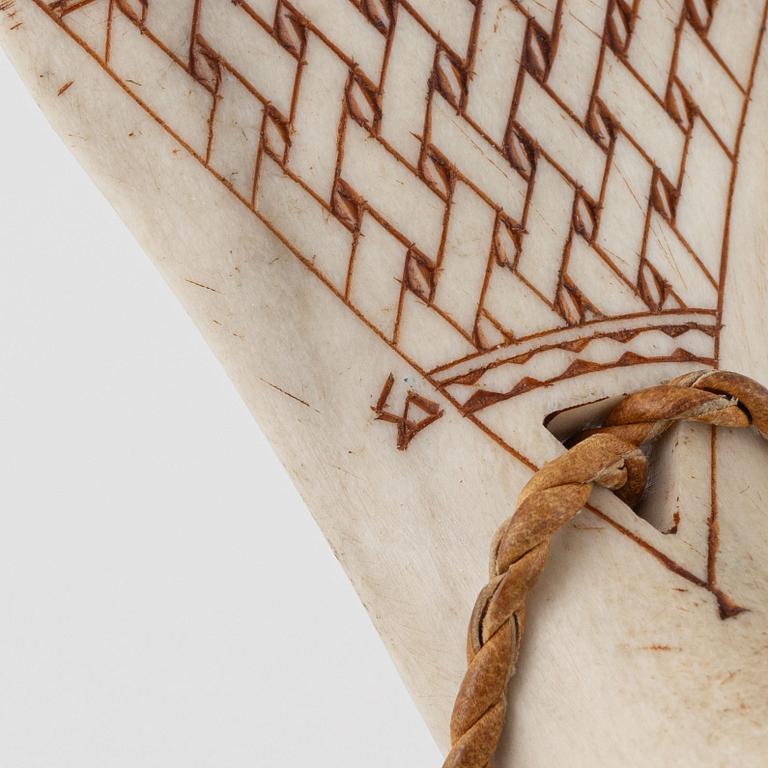 A reindeer horn cup, signed.