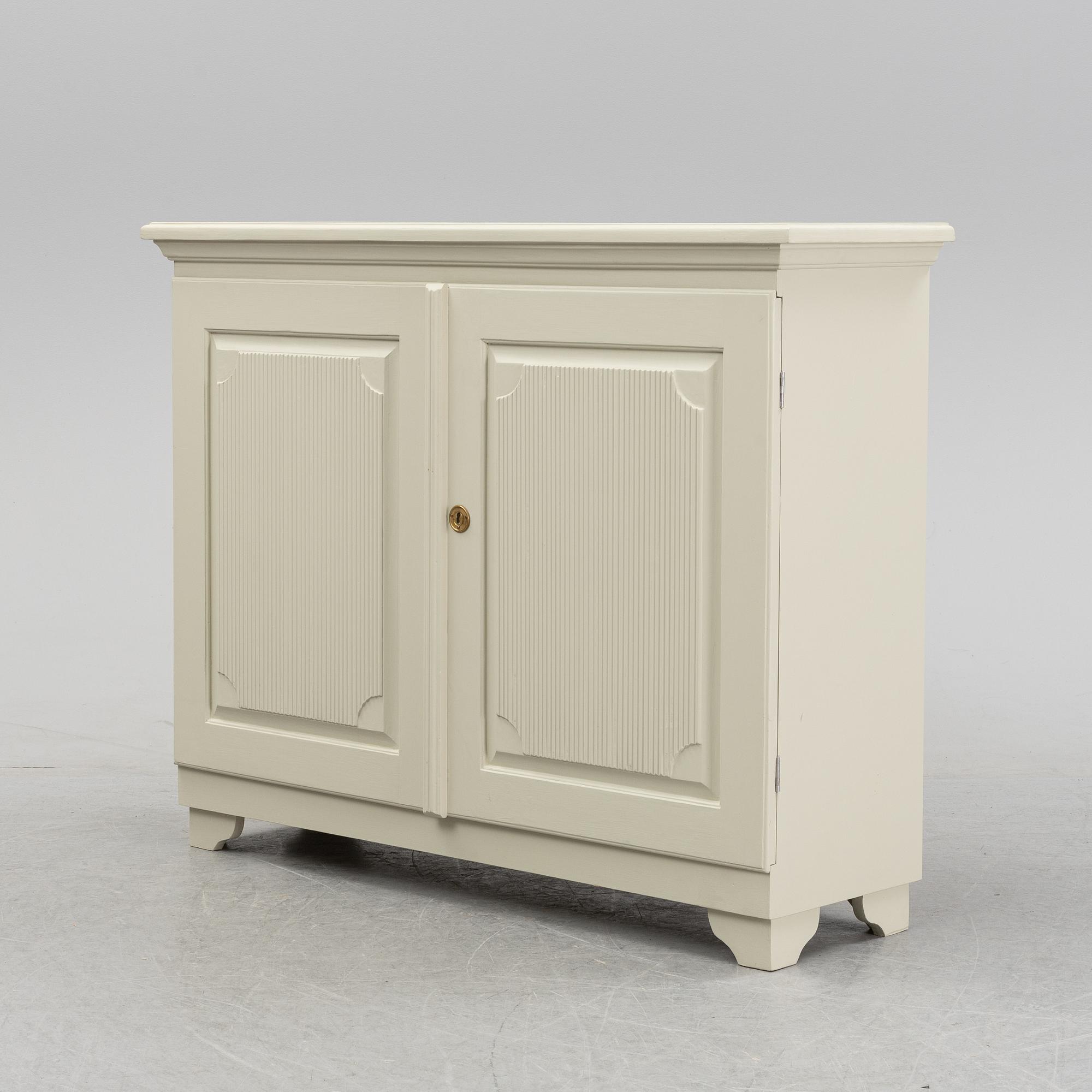 A painted 20th Century cupboard.