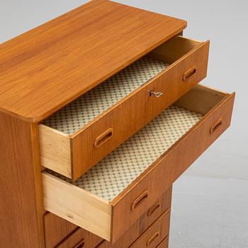 A teak veneered chest of drawers, 1950's/1960's.