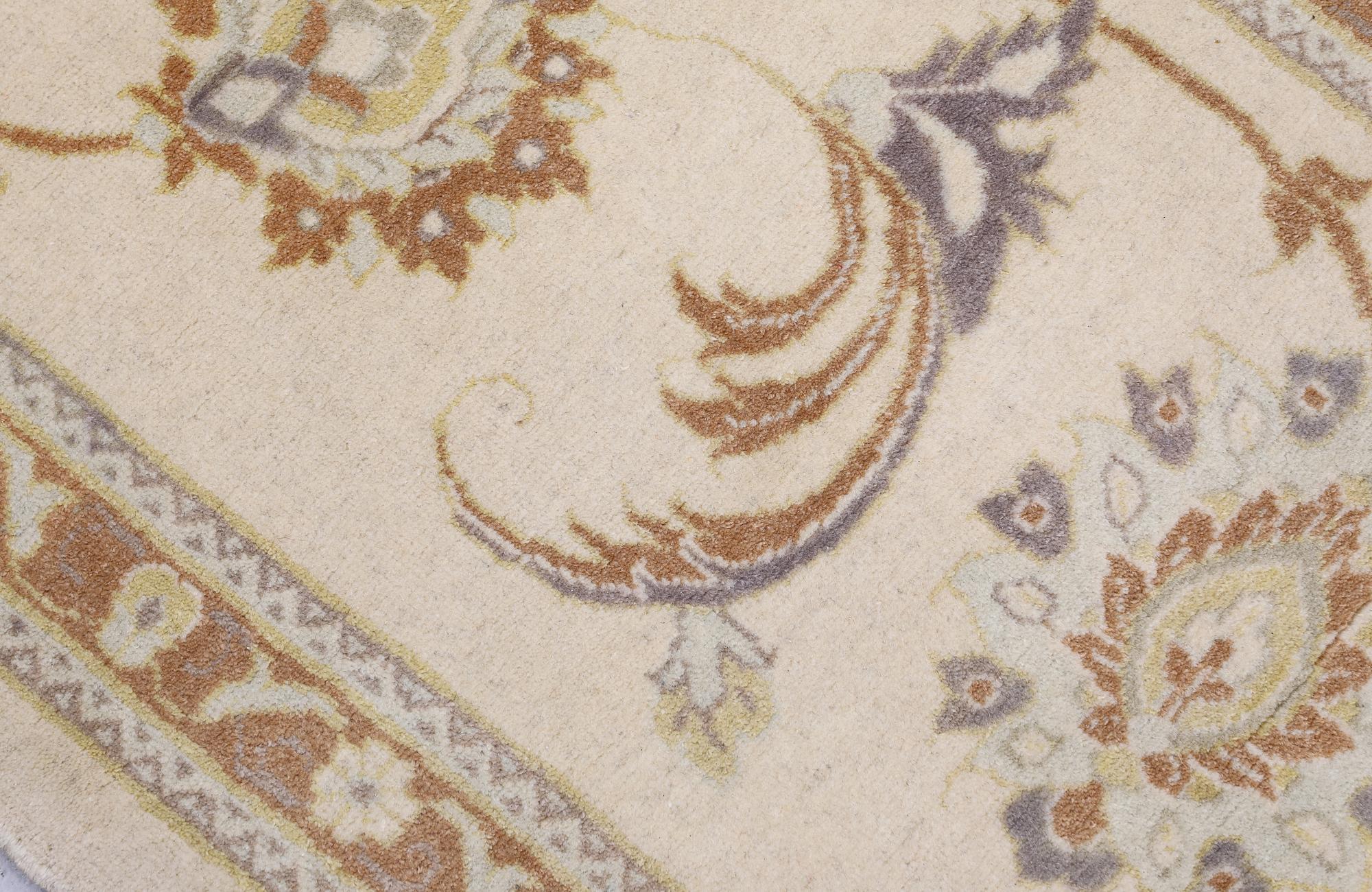 A runner, Ziegler design, c. 398 x 81 cm.