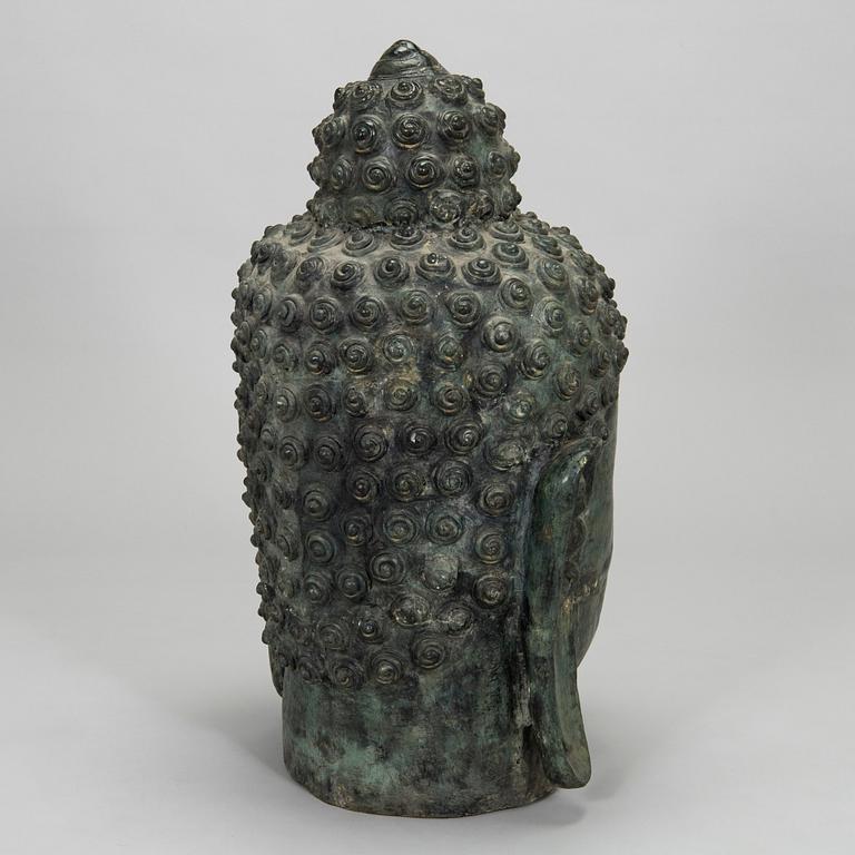 A Buddha sculpture, later half of the 20th century.