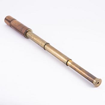 A brass spotting scope from I. H. Steward, London, circa 1900.