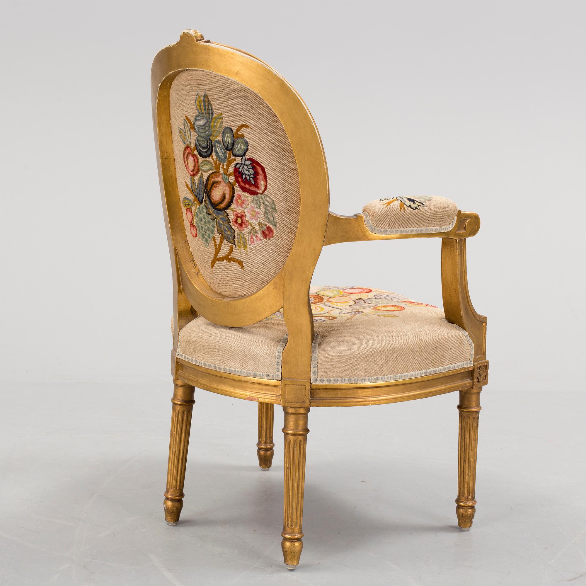 A Gustavian style arm chair, first half ot the 20th Century.
