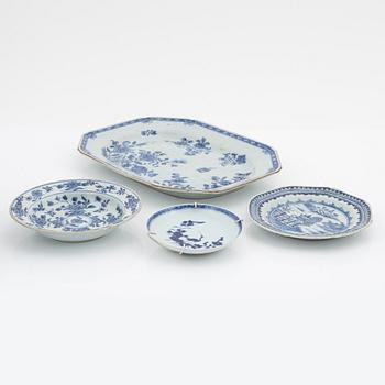 A blue and white serving dish and eight odd plates, Qing dynasty, 18th Century.