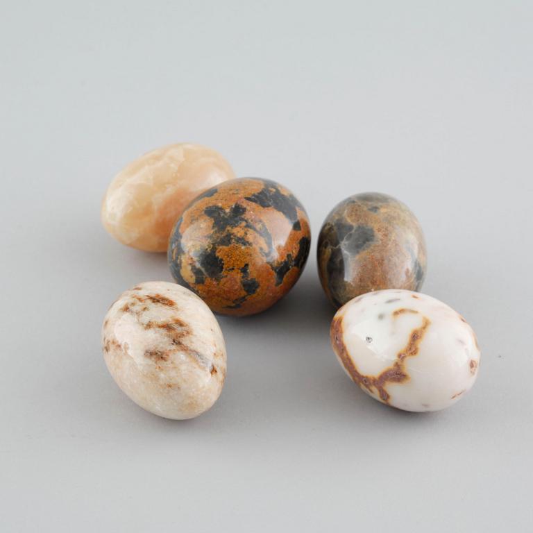 13 stone eggs from the late 20th century.