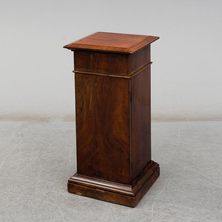 A Swedish Empire bedside table, early 19th century.