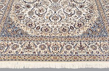 A carpet, Nain part silk so called 9LAA, ca 375 x 244 cm.