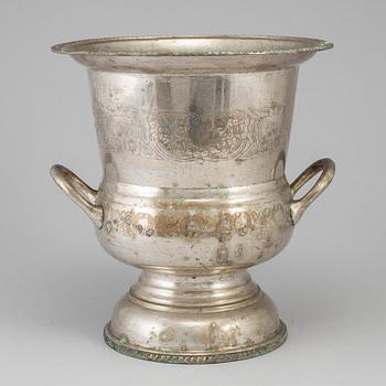 A 19th century plate champagne cooler.