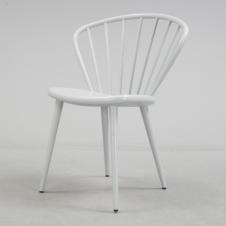 a "Miss Holly" wooden chair by Jonas Lindvall for Stolab.