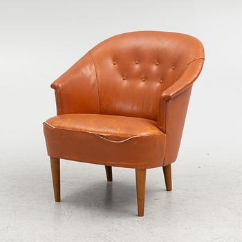 Carl Malmsten, A leather upholstered armchair, model "Lillasyster", O.H. Sjögren, second half of the 20th century.