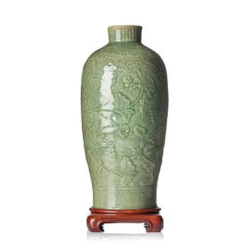 A carved celadon 'longquan' vase, Yuan/Ming dynasty.