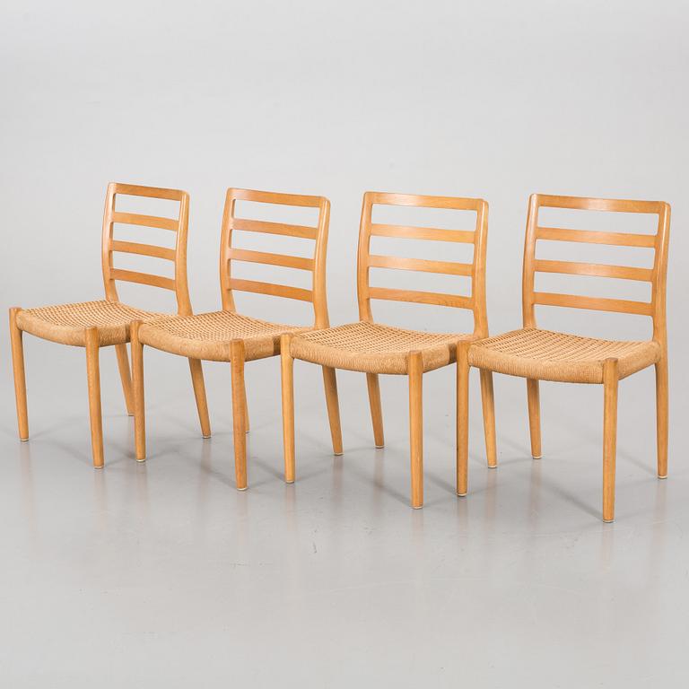 A SET OF 4 CHAIRS AND A TABLE BY Niels O Möller.