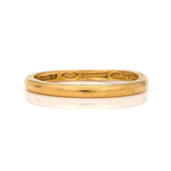 A 23K gold ring.