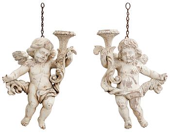 573. A pair of 18/19th cent wooden angels.