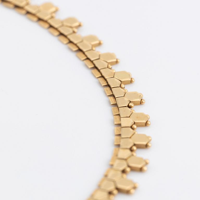 18K gold necklace.