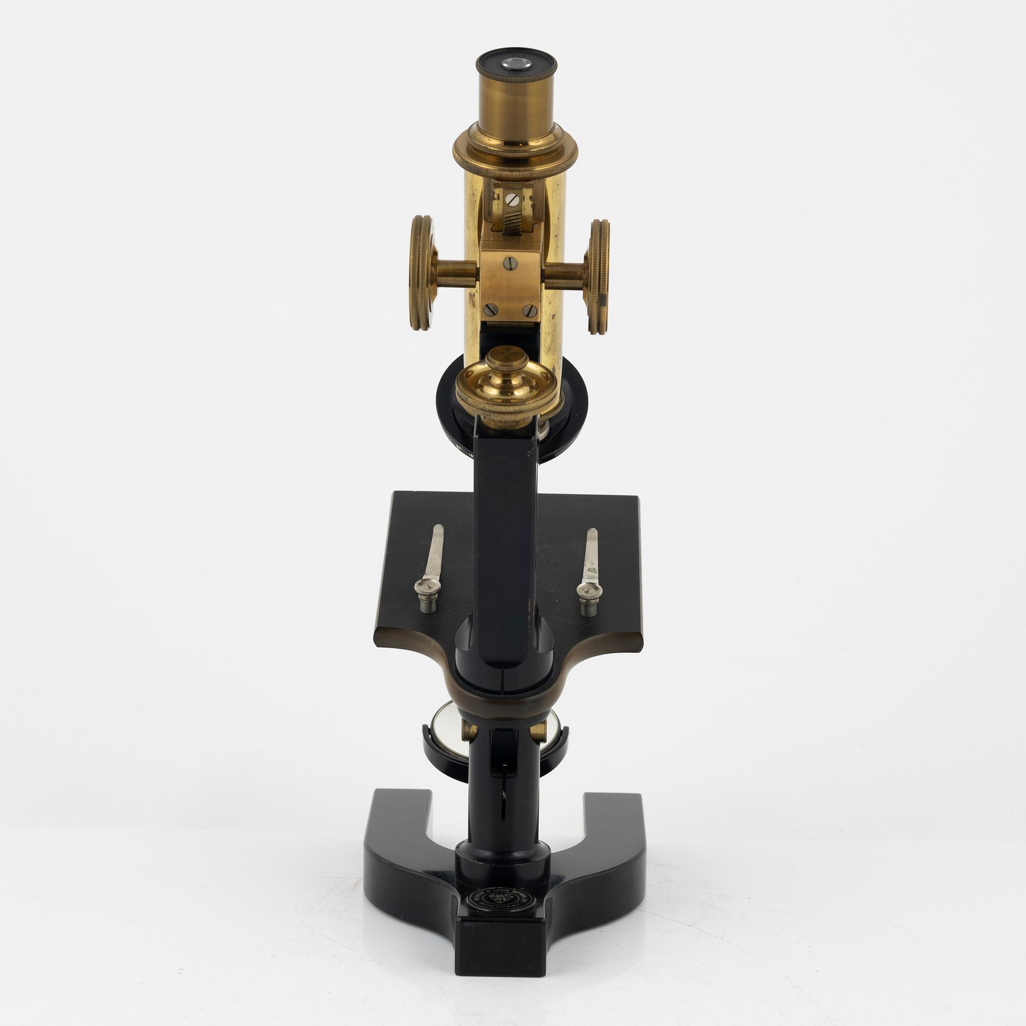 A microscope with accessories, Bausch & Lomb Optical Co. Rochester N.Y, early 20th Century.