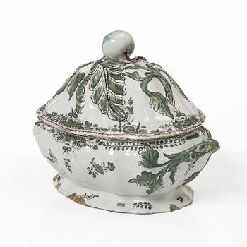 A faience lidded turrine, France, 18th/19th century.