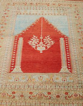 A RUG, an antique silk Tabriz, ca 165 x 122,5 cm.