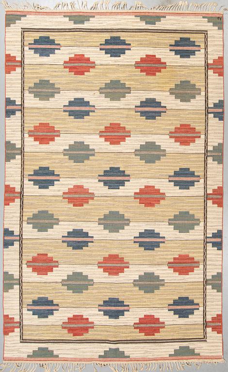 A CARPET, flat weave, ca 313 x 200,5 cm, signed L J (probably Lilian Johanesson).