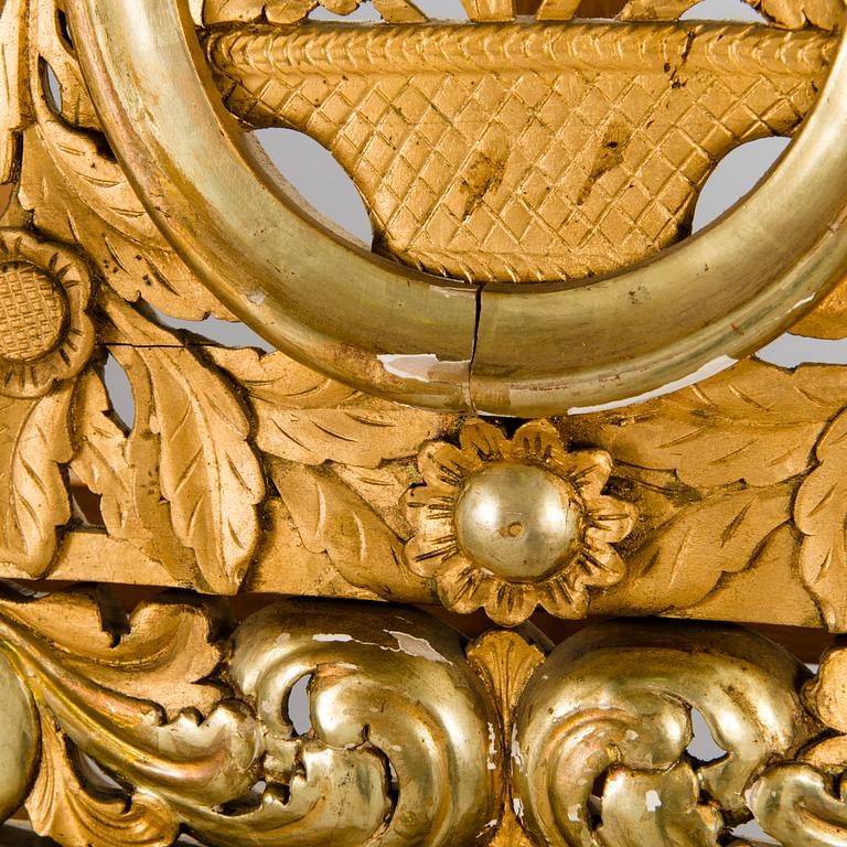 A MIRROR, Baroque style, circa 1900, gilt wood.