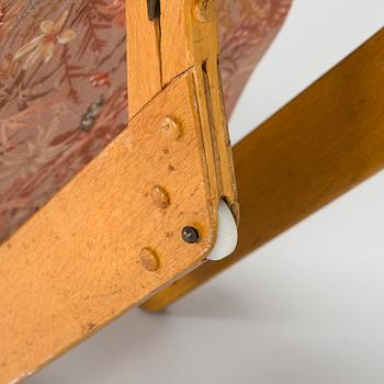 Ilmari Tapiovaara, an early 1960s 'Dolphin chair' for Skanno.