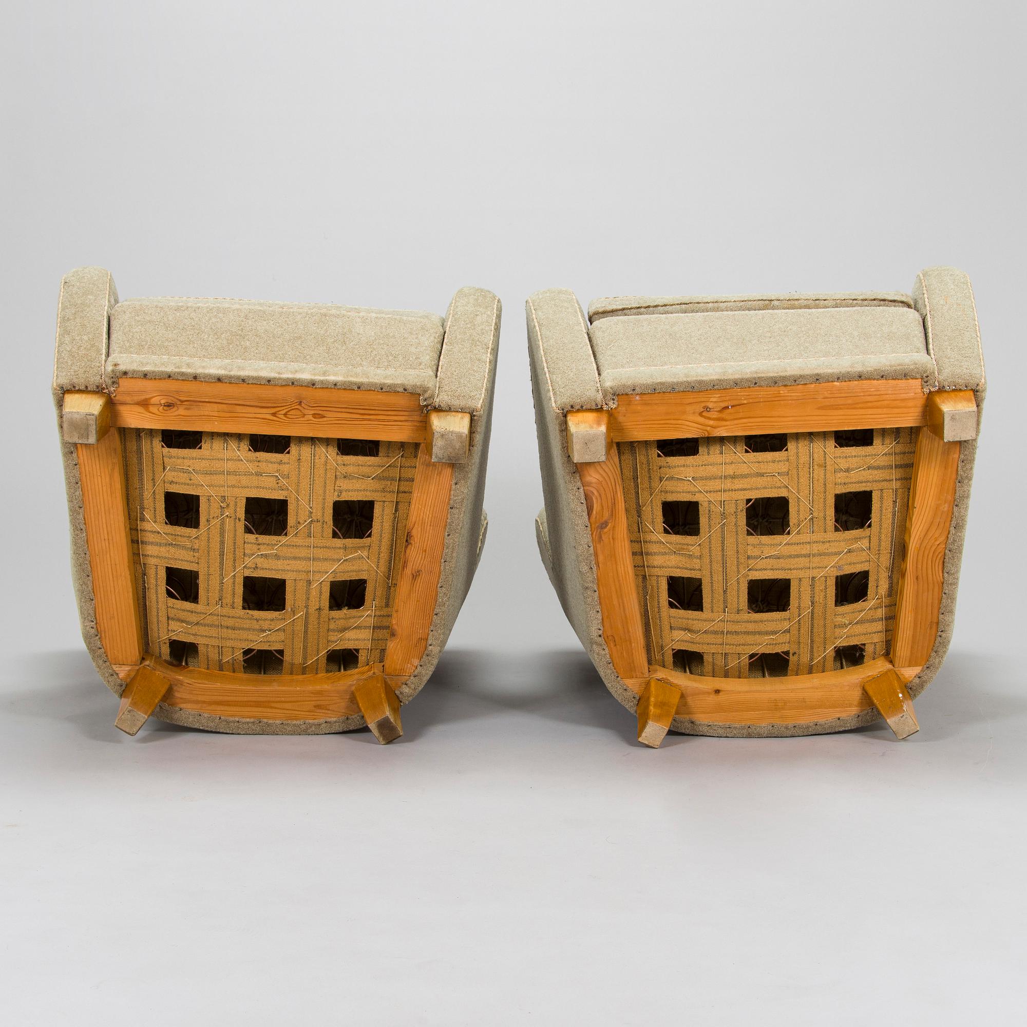 A pair of mid-20th century armchairs.