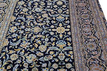 A Kashan carpet, c. 360 x 260 cm.