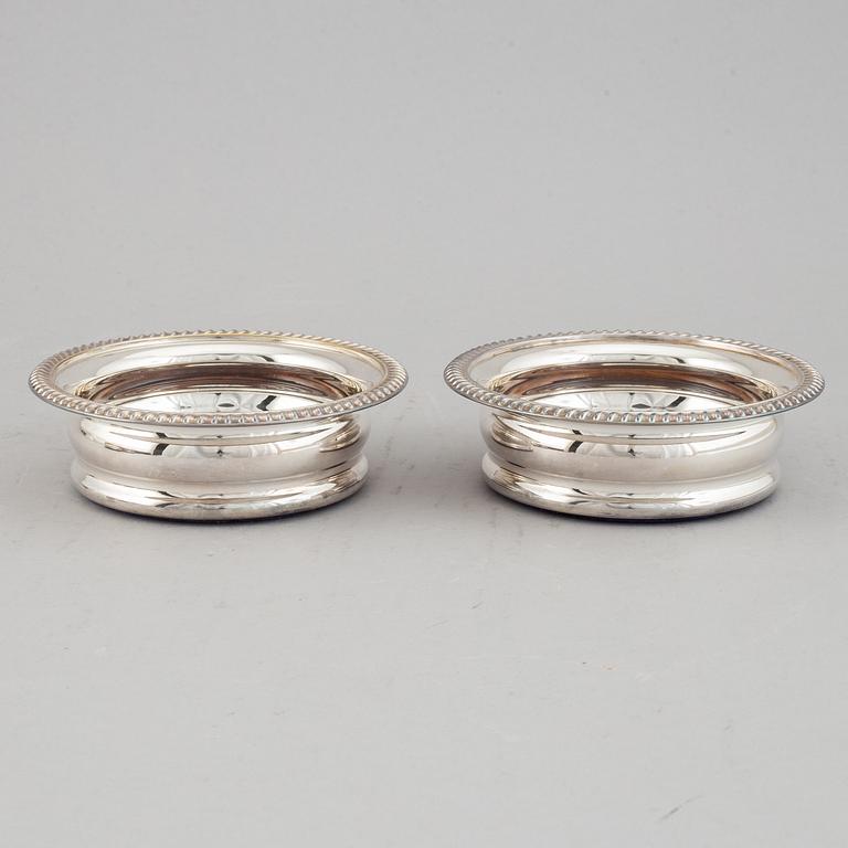 Coasters, two pairs, silver plate, England.