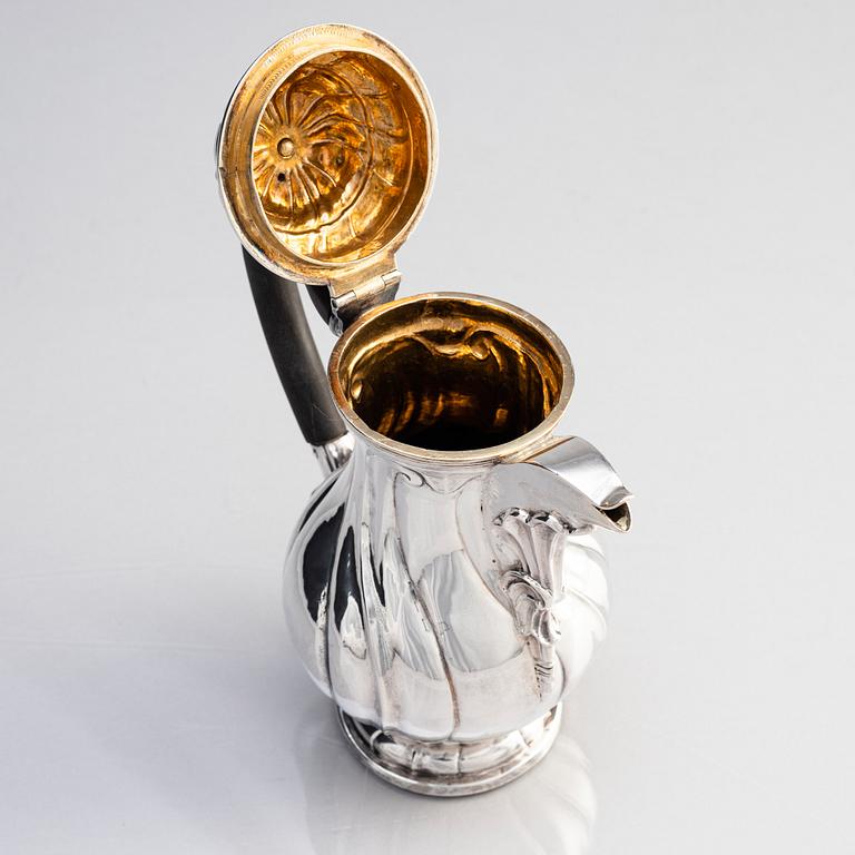 An 18th century silver coffee pot, mark of Carl Gustaf Hellmuth, St Petersburg 1770.