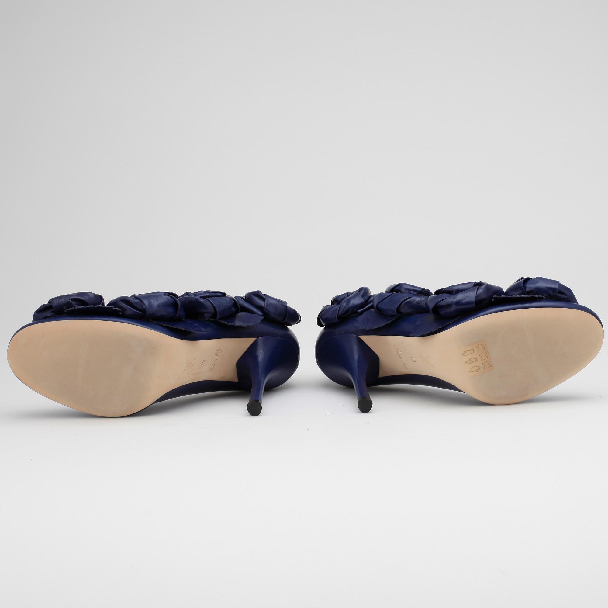 LOUIS VUITTON, a pair of purple leather lady's shoes.