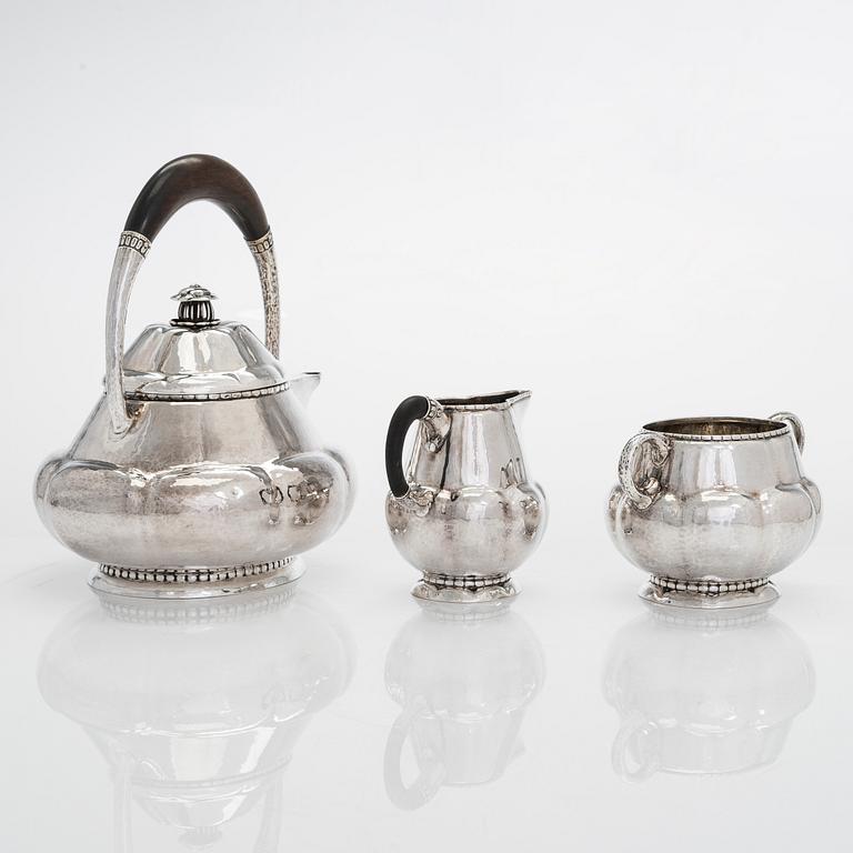 Albert Feinauer, a six-piece silver coffee and tea service with tray, Weimar-Schmuck, Germany 1921-1925.