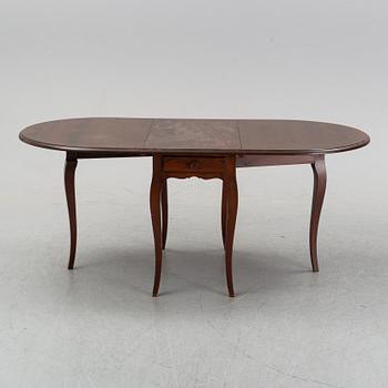 A stained pine gate-leg table, Åmells möbler.
