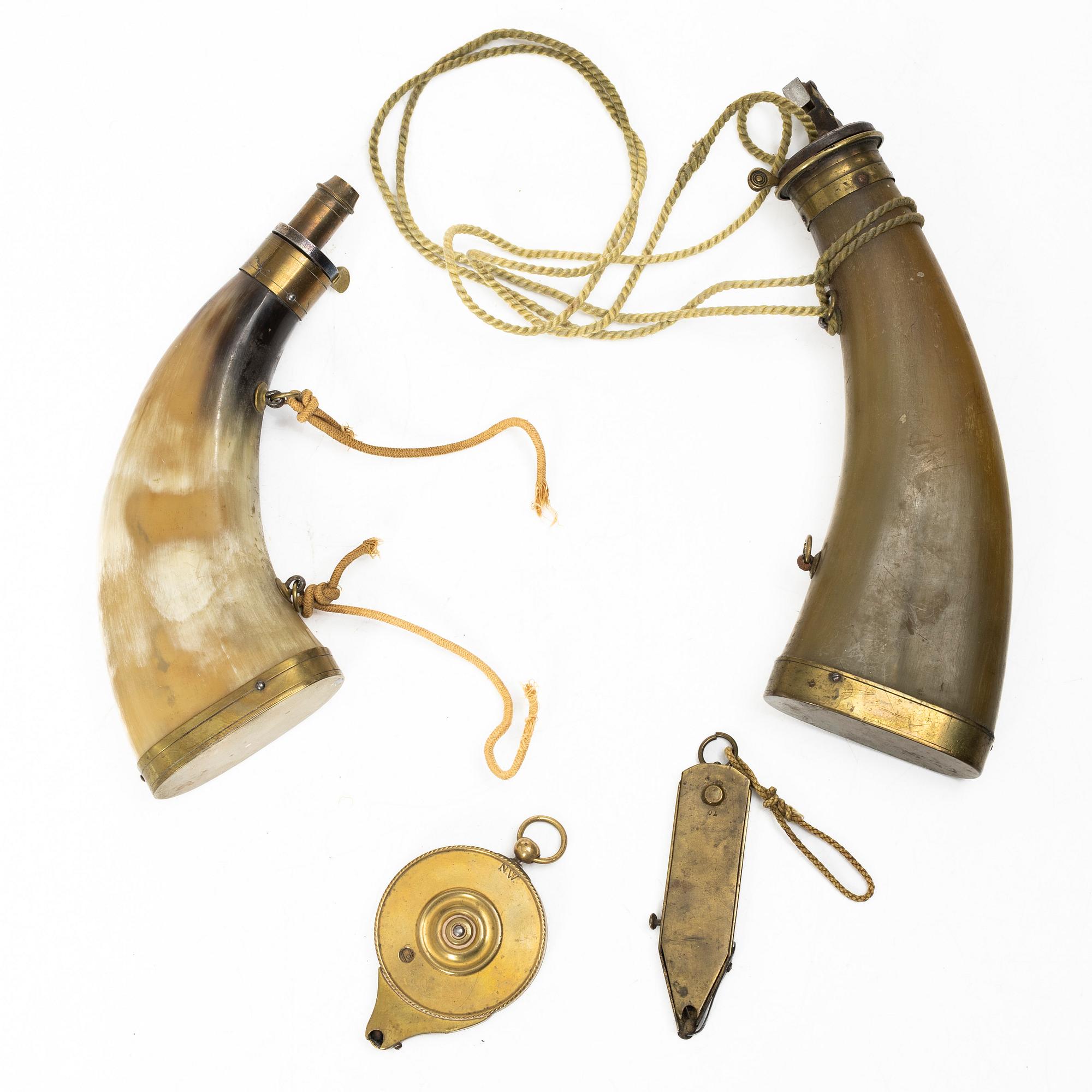 Two percussion cap containers 199th century, and two powder horns.