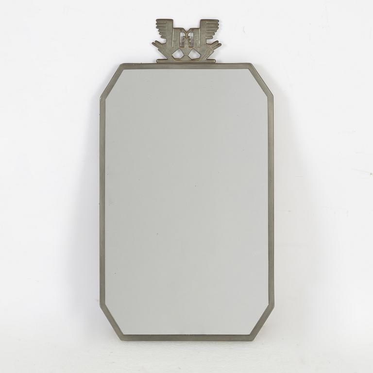 A Swedish pewter mirror, 1934.