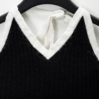 Chanel, A cotton halterneck top, size 34.