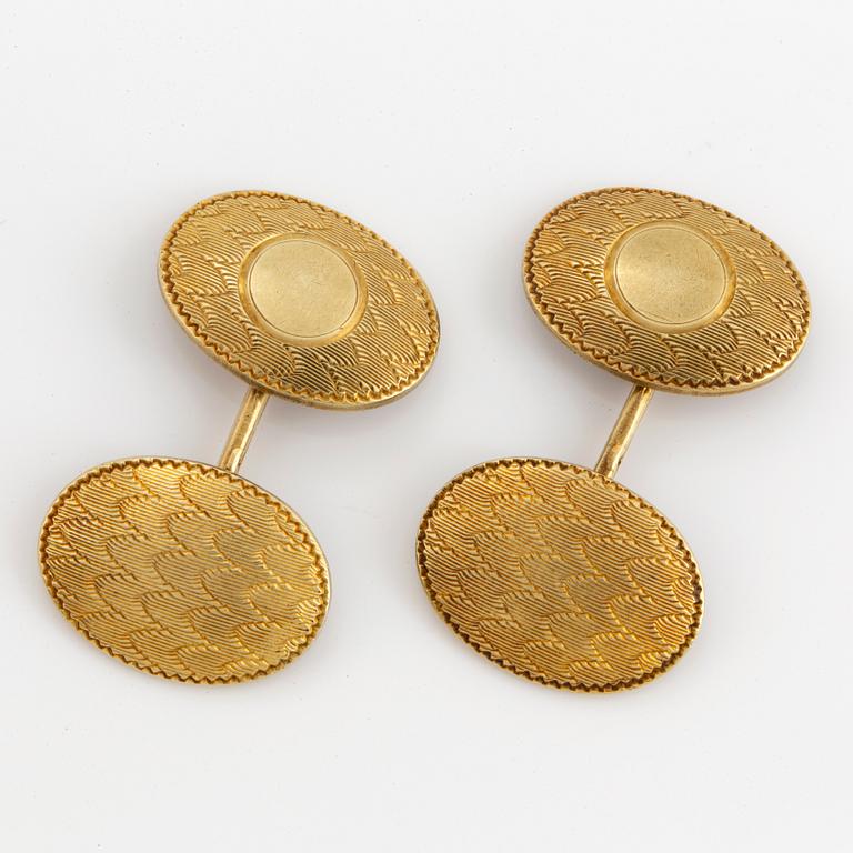 14K gold cufflinks.