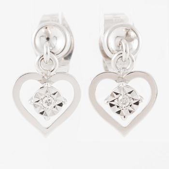 Earrings, a pair, 18K white gold with small diamonds in the shape of hearts.