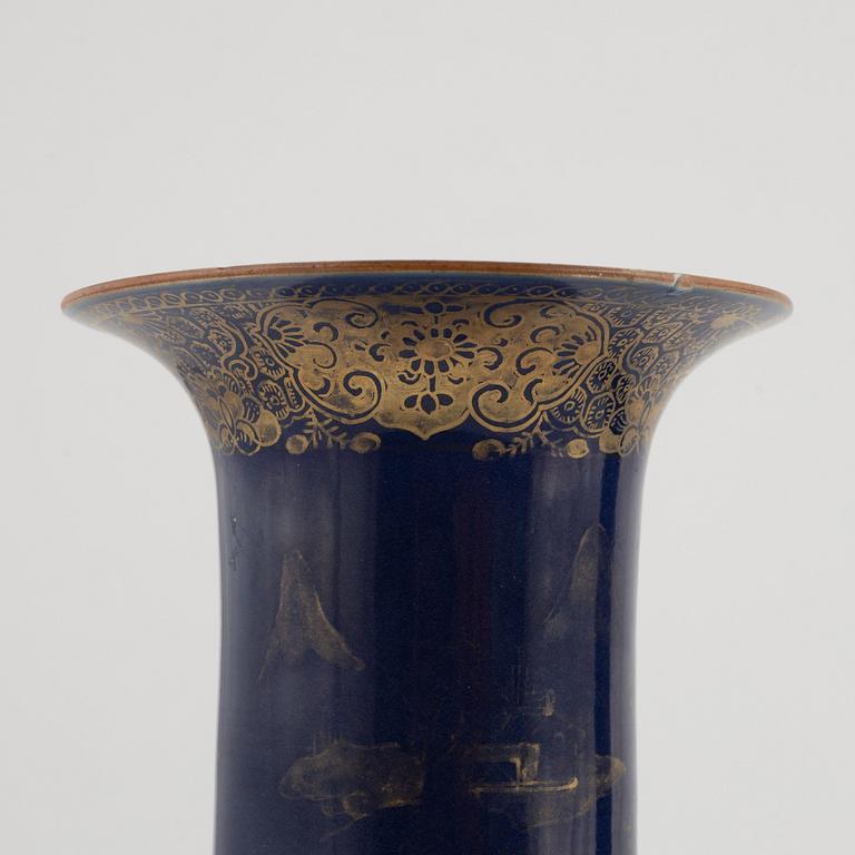 A pair of powder blue and gold 'trumpet' vases, Qing dynasty, 18th century.