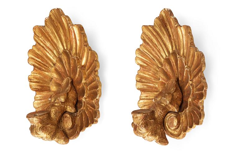 A pair of Matts Eriksson carved and gilt Swedish Grace wall scones, Arvika Sweden.
